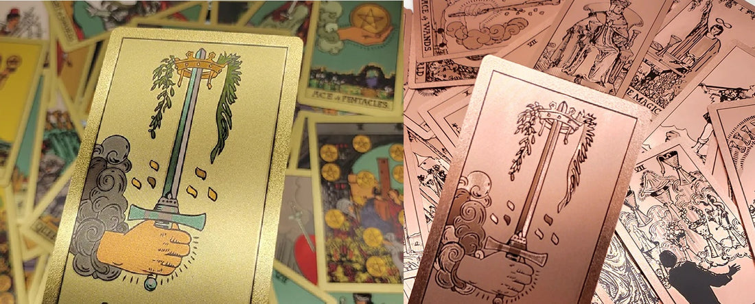 Two different tarot cards in focus with many tarot cards in background