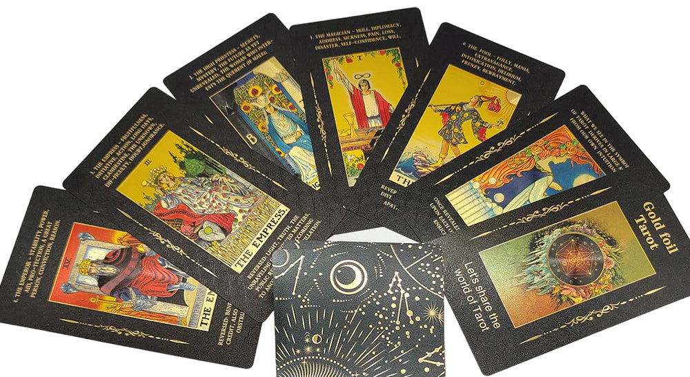 Multiple tarot cards showing the design of the astrology set, main black colour with gold design accents