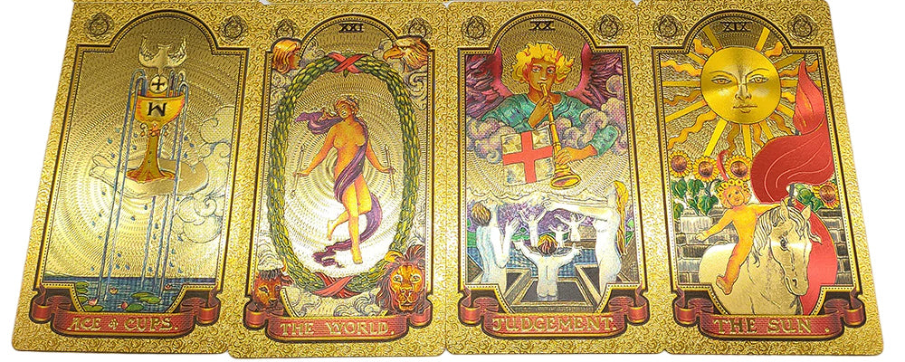 Four golden sun astrology cards displaying the front face of the cards design