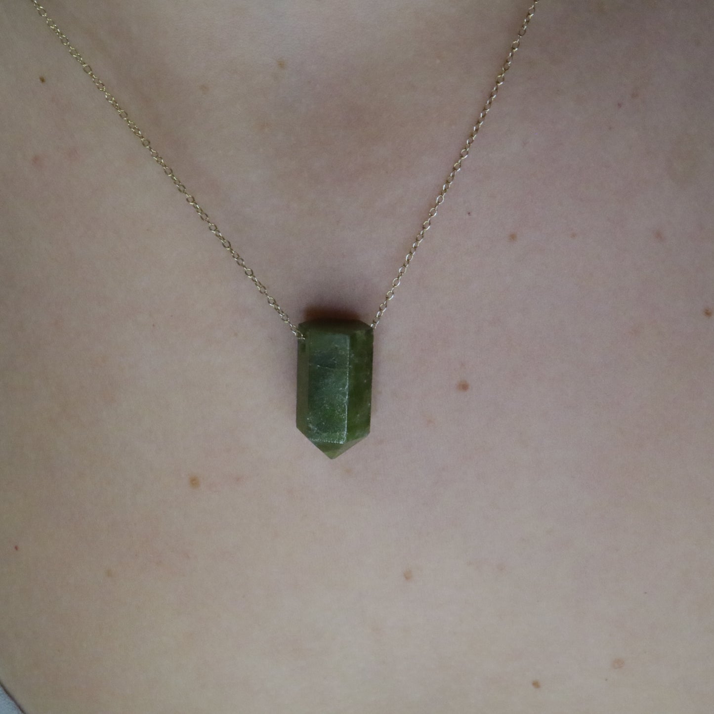 Girl wearing Vessonite crystal necklace