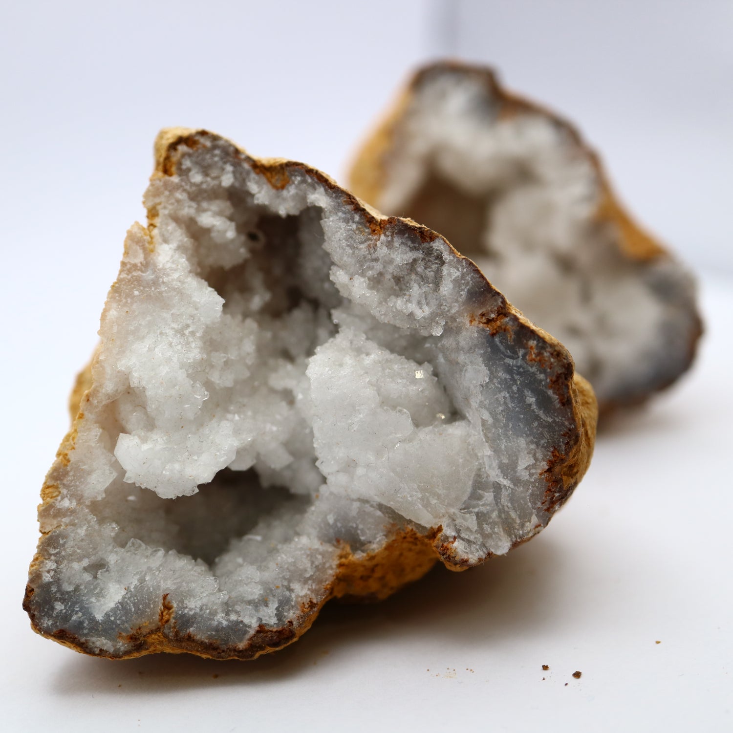 A geode crystal broken into two parts