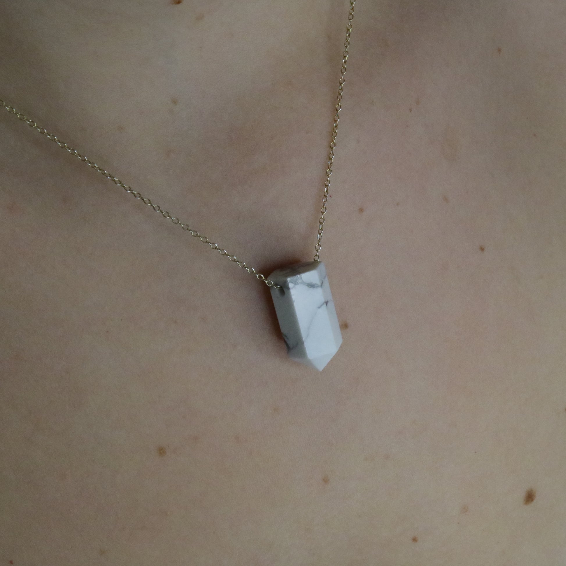 Girl wearing Howlite crystal necklace