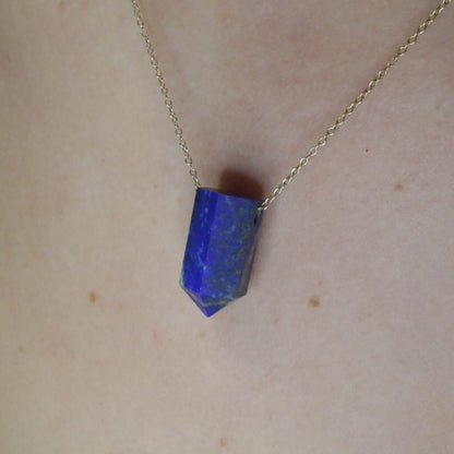 Girl wearing Lapis Lazuli crystal necklace