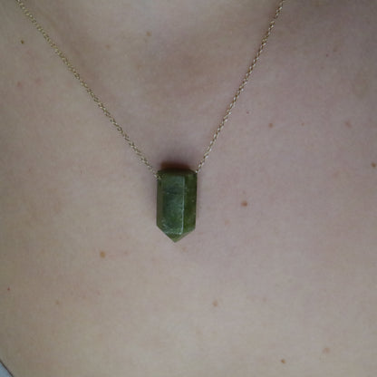 Girl wearing Vessonite crystal necklace 